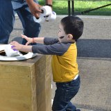 Two-year-old Francisco Ochoa having fun at the Fall Festival.